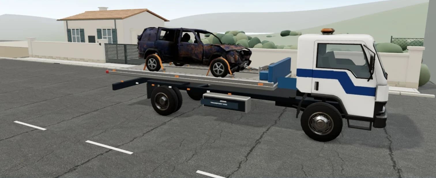 Aperçu de la simulation 3D : un véhicule hors d’usage arrimé sur le plateau d’une dépanneuse.
